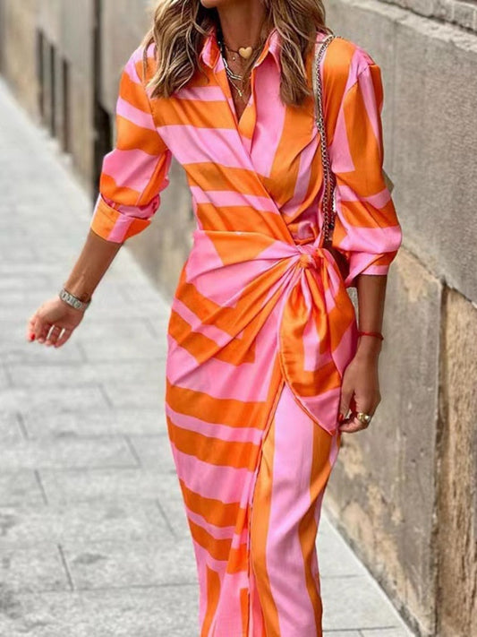"Elegante Elouise wikkeljurk met kraag, lange zomerjurk, flatterend ontwerp met zachte materialen voor comfort."