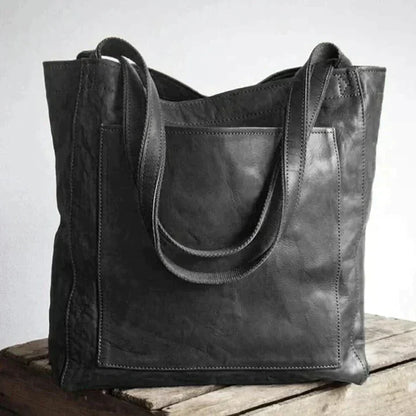 "Elegante grote leren damestas voor vrouwen, bruine schoudertas met ruime opbergruimte en tijdloos ontwerp."