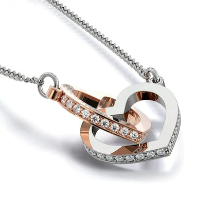 Elegante harten ketting in witgoud en rosé goud met zirkonia, verstelbaar, perfect cadeau voor dochter, symboliseert liefde.