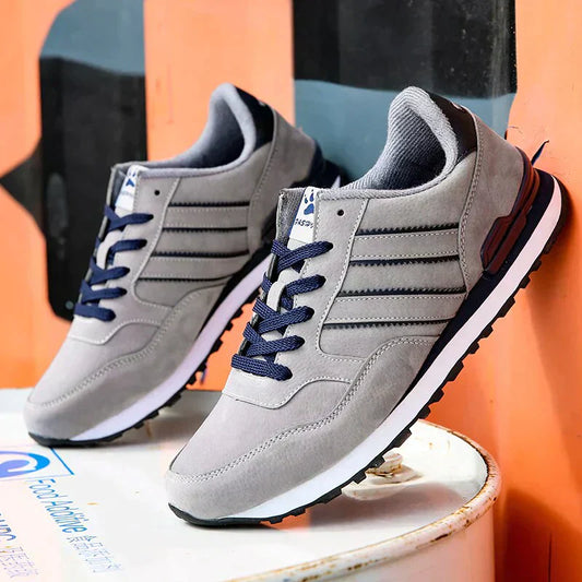 "Elegante klassieke herensneakers in blauw, grijs en zwart, stijlvol ontwerp voor casual en chique looks, comfortabel en veel