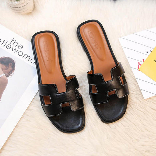 "Elegante leren dames slippers Juliana met open teen en rechte snit, hoogwaardig leer, luxe en comfort voor elke outfit"
