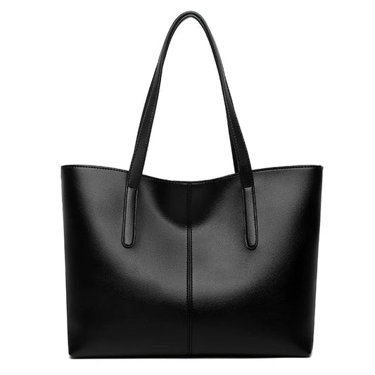 Elegante leren schoudertas in rood, met verstelbare riem en ruim interieur, perfect voor dagelijkse organisatie en stijl.