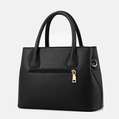 Elegante leren schoudertas voor dames, stijlvol en ruim, met verstelbare riem en verschillende kleurkeuzes.