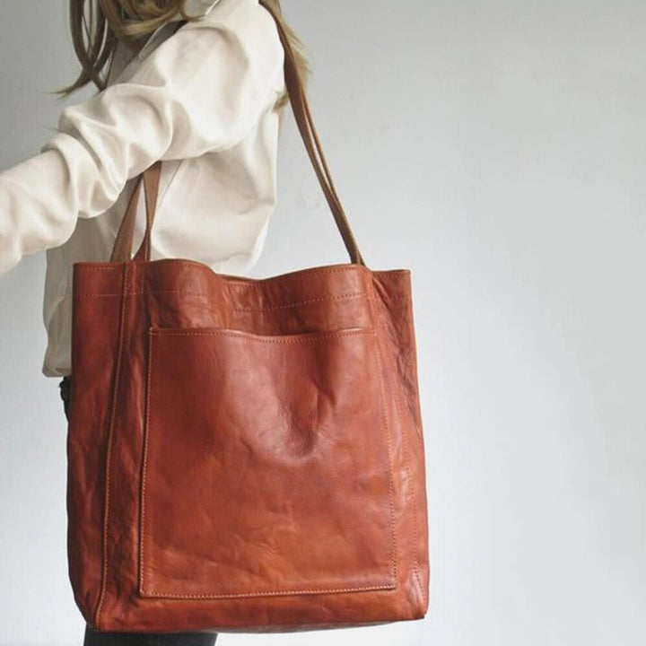 Elegante bruine leren schoudertas voor vrouwen, PU leer, perfect als handtas en damestas.