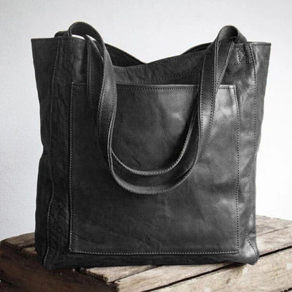 Elegante, leren tas voor dames, chique uitstraling, vlekbestendig interieur, perfecte toevoeging aan elke garderobe.
