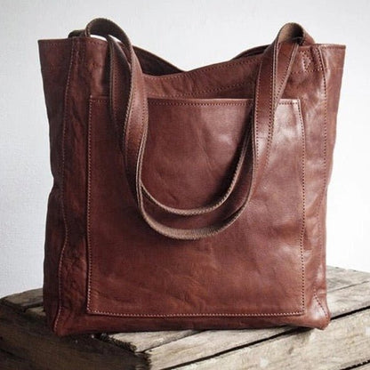 Elegante, leren tas voor dames, chique uitstraling, vlekbestendig interieur, perfecte toevoeging aan elke garderobe.