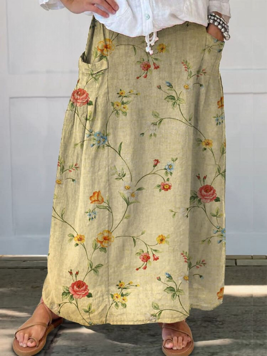 Elegante linnen bloemenrok met zakken, premium stof, vrouwelijk ontwerp, kleurrijke bloemenprint en luxueus comfort.
