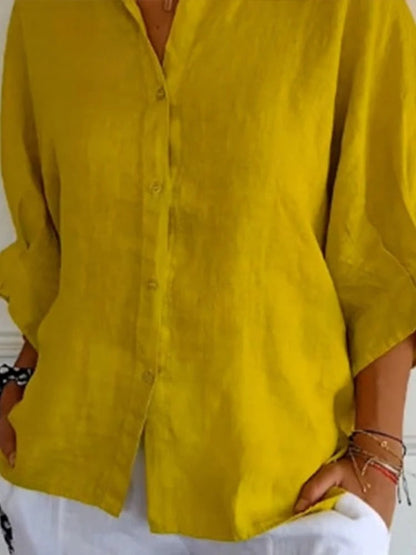 "Elegante linnen damesblouse met V-hals en strikje, luchtige katoen-linnenmix, vrouwelijk silhouet, veelzijdig design."