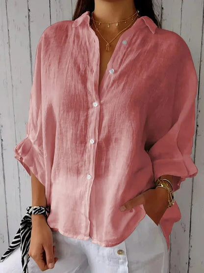 "Elegante linnen damesblouse met V-hals en strikje, luchtige katoen-linnenmix, vrouwelijk silhouet, veelzijdig design."