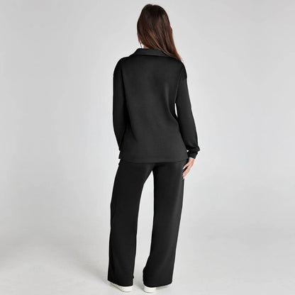 "Elegante loungewear set voor dames met off-shoulder sweater en perfect passende broek, trendy en comfortabel zichtbaar."