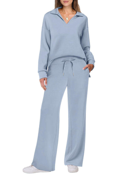 "Elegante loungewear set voor dames met off-shoulder sweater en perfect passende broek, trendy en comfortabel zichtbaar."