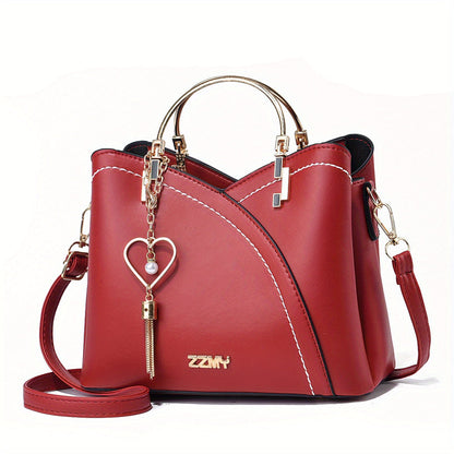"Elegante luxe leren handtas met stijlvol kleurblokontwerp en kwastjes, perfect voor de moderne vrouw, frontaal gezien."