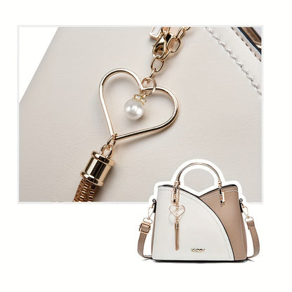 "Elegante luxe leren handtas met stijlvol kleurblokontwerp en kwastjes, perfect voor de moderne vrouw, frontaal gezien."