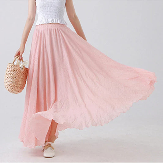 "Elegante maxi-rok van zachte katoen in een neutrale tint, met hoge taille, perfect voor dagelijks en avondgebruik."