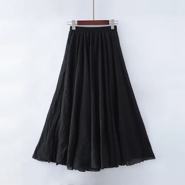 "Elegante maxi-rok van zachte katoen in een neutrale tint, met hoge taille, perfect voor dagelijks en avondgebruik."