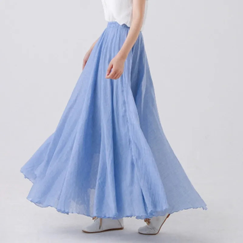 "Elegante maxi-rok van zachte katoen in een neutrale tint, met hoge taille, perfect voor dagelijks en avondgebruik."
