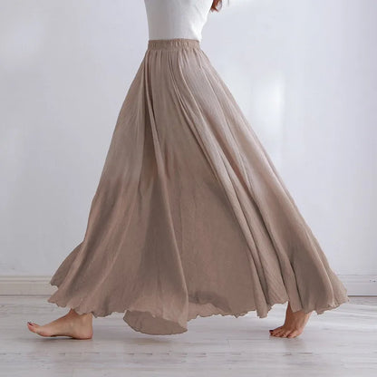 "Elegante maxi-rok van zachte katoen in een neutrale tint, met hoge taille, perfect voor dagelijks en avondgebruik."