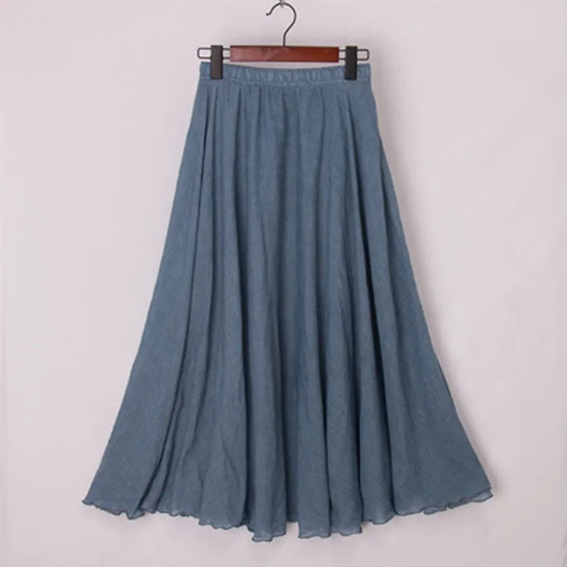 "Elegante maxi-rok van zachte katoen in een neutrale tint, met hoge taille, perfect voor dagelijks en avondgebruik."