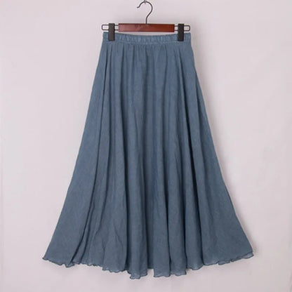 "Elegante maxi-rok van zachte katoen in een neutrale tint, met hoge taille, perfect voor dagelijks en avondgebruik."