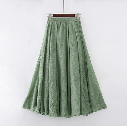 "Elegante maxi-rok van zachte katoen in een neutrale tint, met hoge taille, perfect voor dagelijks en avondgebruik."