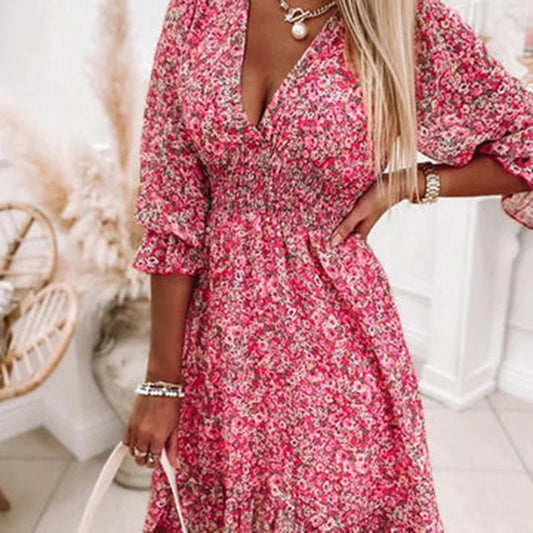 "Elegante midi zomerjurk voor dames met korte mouwen en V-hals, beschikbaar in roze, blauw en groen."