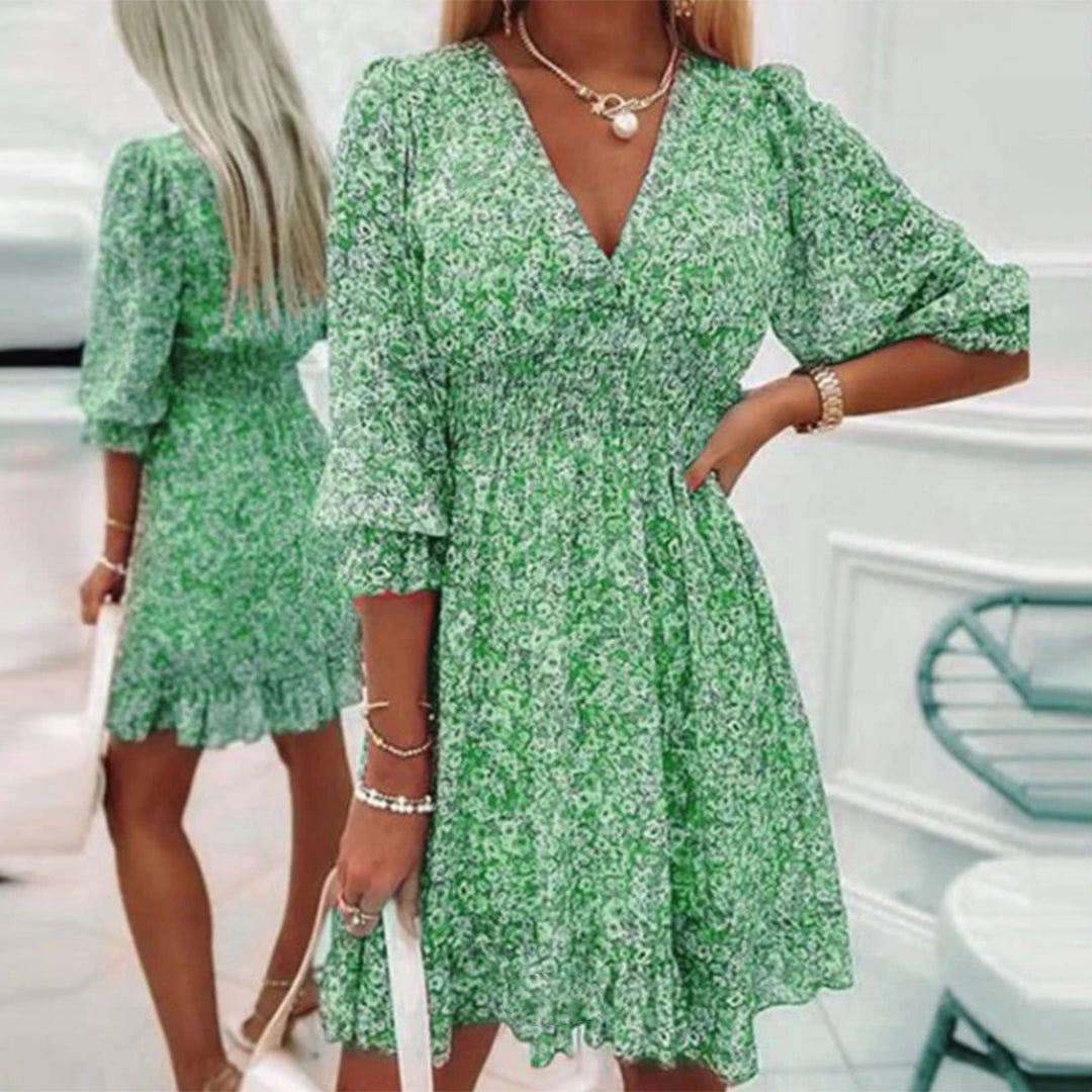 "Elegante midi zomerjurk voor dames met korte mouwen en V-hals, beschikbaar in roze, blauw en groen."