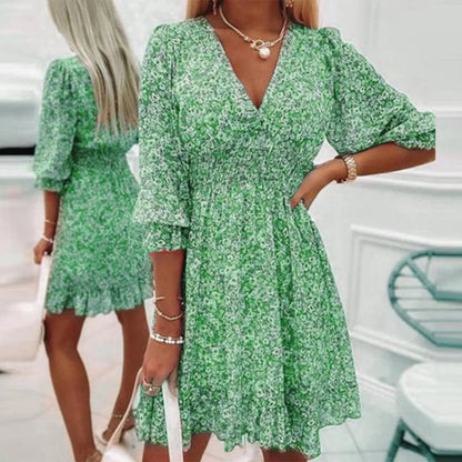 "Elegante midi zomerjurk voor dames met korte mouwen en V-hals, beschikbaar in roze, blauw en groen."