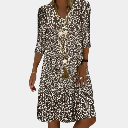 "Elegante midi zomerjurk voor dames met V-hals en korte mouwen, ideaal voor warme dagen in blauw, groen, bruin of rood."
