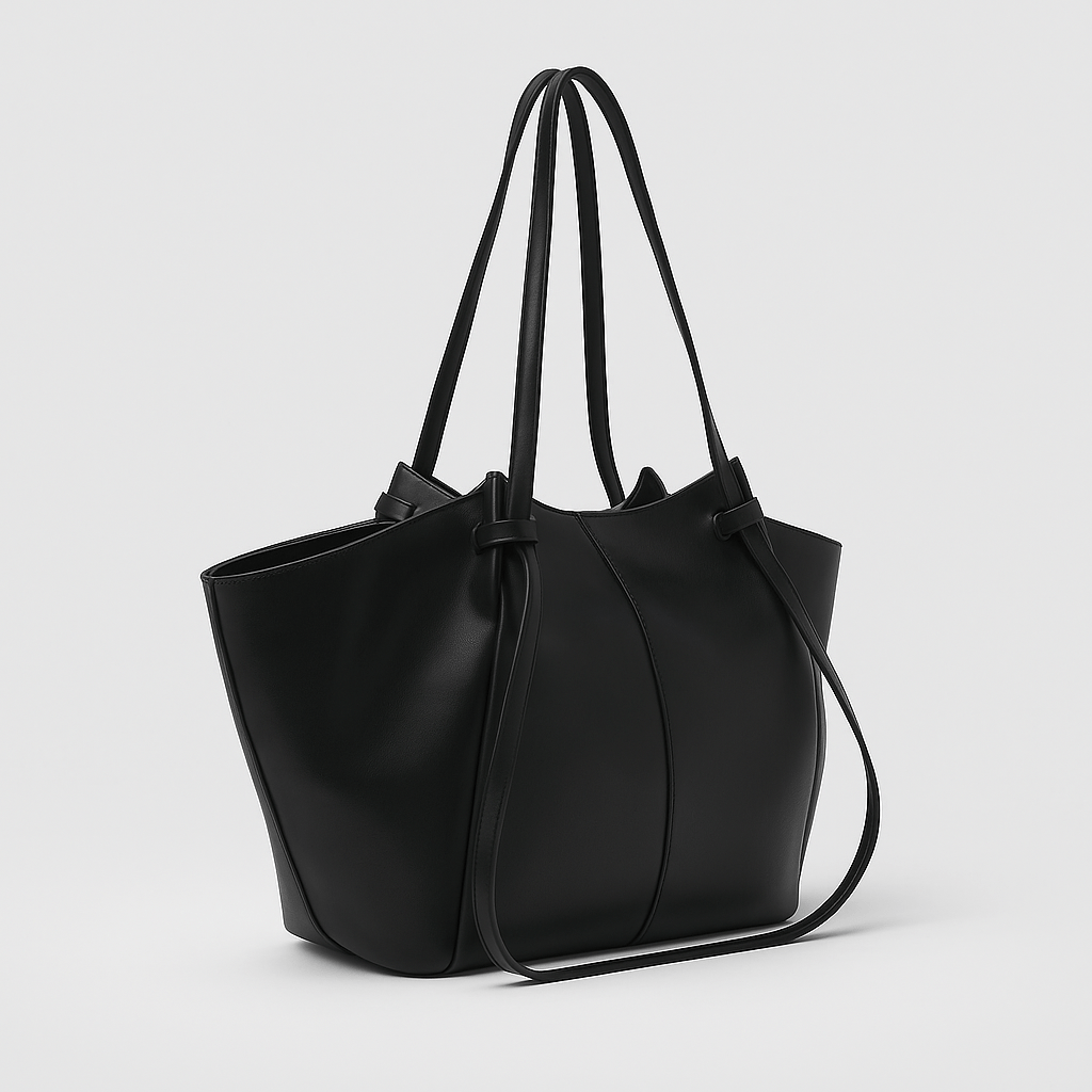 Modieuze zwarte PU leren handtas, ideaal als ruime shopper voor dagelijks gebruik.