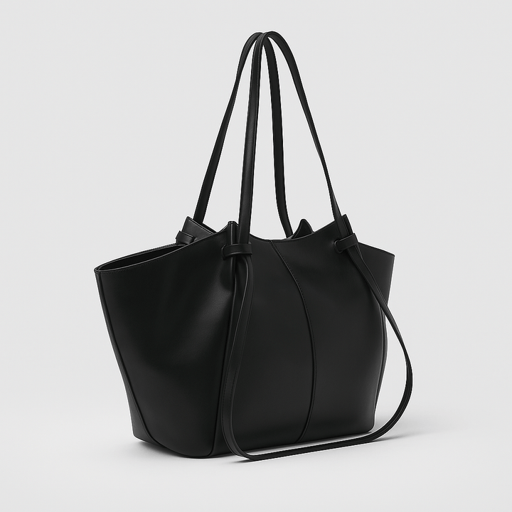 Modieuze zwarte PU leren handtas, ideaal als ruime shopper voor dagelijks gebruik.