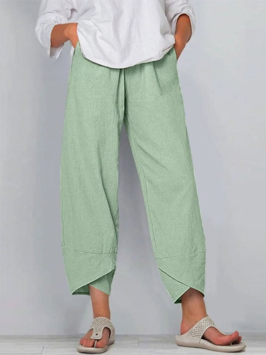 "Elegante Silvia Linnen Broek met relaxte pasvorm, elastische taille en zijzakken, perfect voor casual en comfort."
