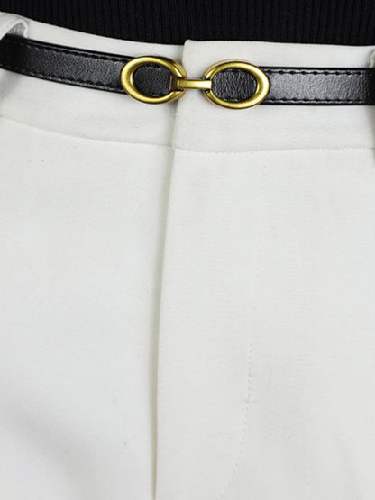 "Elegante smalle damesriem van leer met moderne gouden ringengesp, ideaal voor elke stijlvolle outfit"