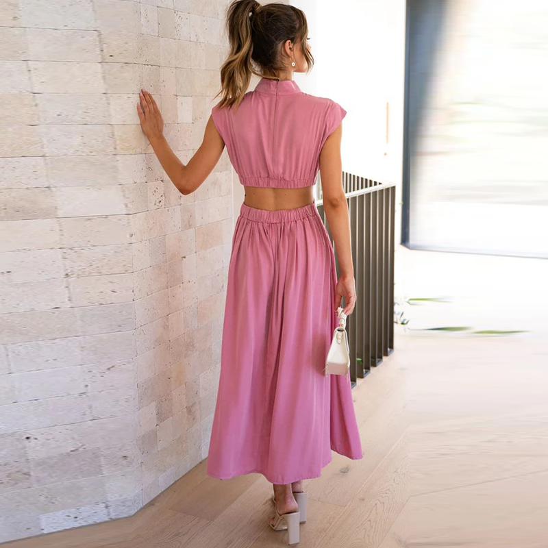 "Elegante vakantiejurk met korte mouw en opstaande kraag, biedt stijl en comfort voor elke gelegenheid, ideaal voor zomerdage