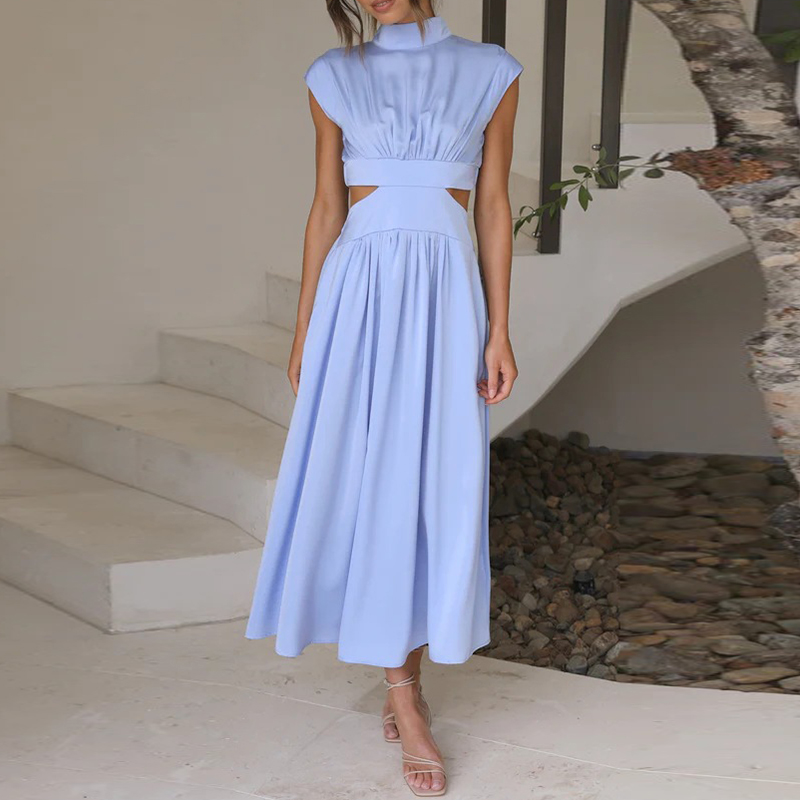 "Elegante vakantiejurk met korte mouw en opstaande kraag, biedt stijl en comfort voor elke gelegenheid, ideaal voor zomerdage
