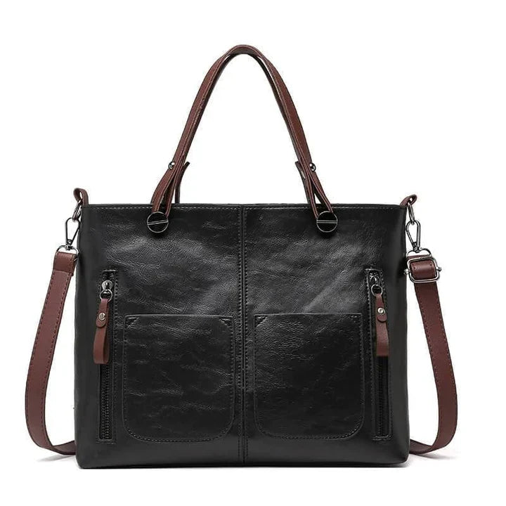 "Elegante vintagestijl leren schoudertas voor dames met bruine tinten, perfect voor een klassieke en tijdloze look."
