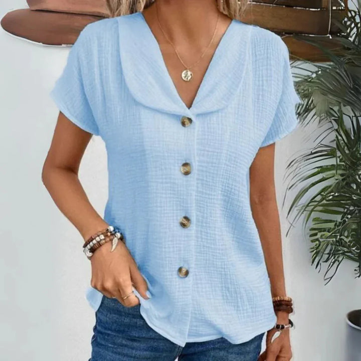 Nieuwe elegante dames zomerblouse met V-hals, losse pasvorm en driekwartmouw. Trendy en comfortabel.