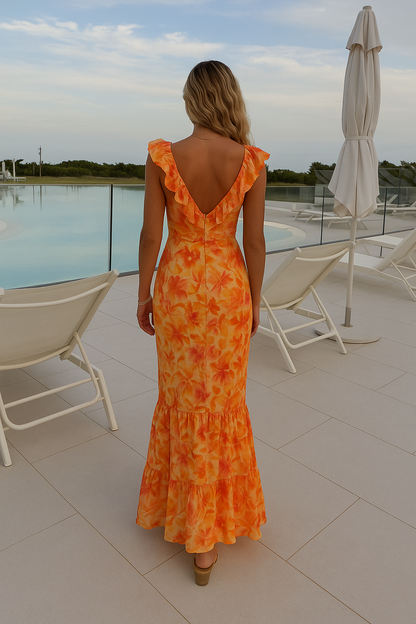 "Elegante zomerjurk met kleurrijke bloemenprint, ruffles en strikdetail, in tinten oranje, roze en geel, zomermode dames."