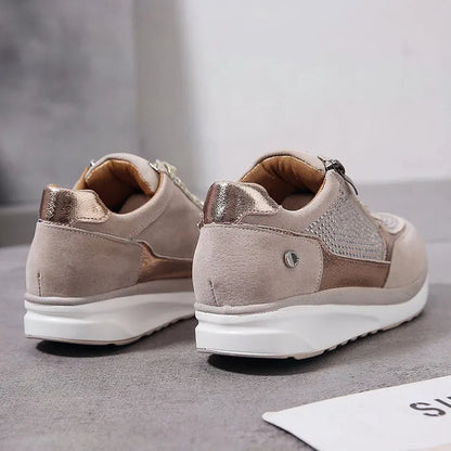 "Ergonomische damessneakers in grijs met ademende materialen, bieden stijl en comfort voor dagelijks gebruik."