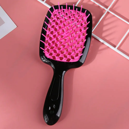 "Ergonomische ontwarring borstel met luchtkussen, bevordert snelle droging en pijnloze knoopverwijdering voor alle haartypes.