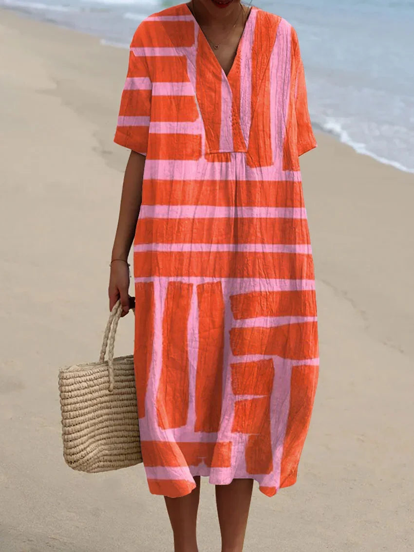 Mouwloze midi jurk met klassiek ruitpatroon, perfect als comfortabele dames zomerjurk.