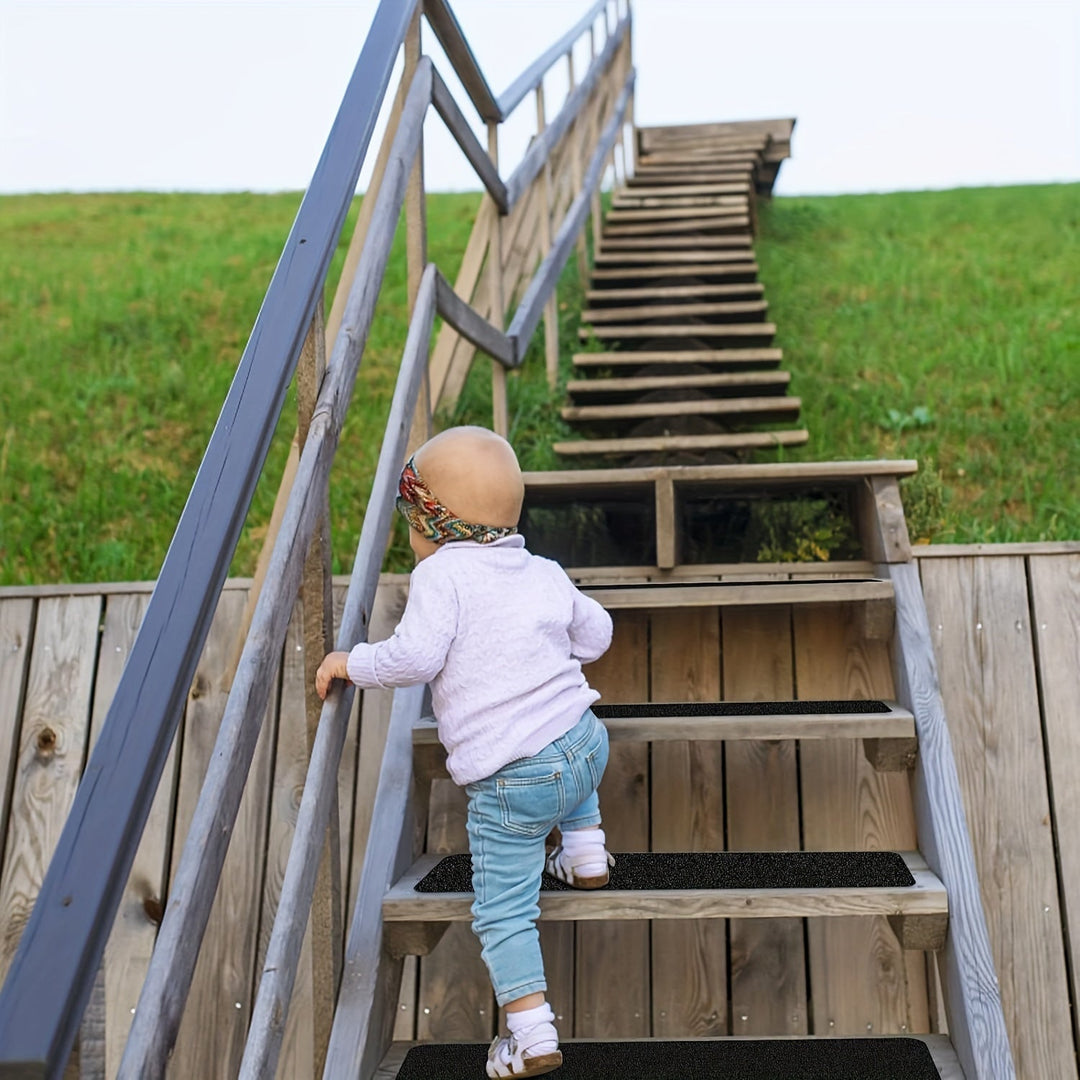 Set van 10 zwarte antislip trapstrips met sterke grip, essentieel voor de veiligheid van uw trappen thuis.