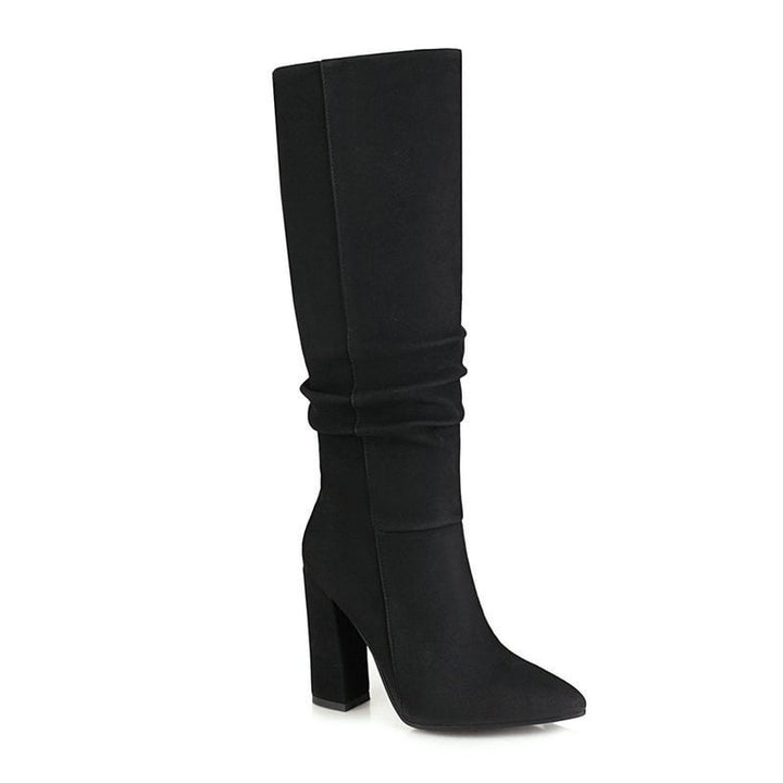 Luxe dames winterlaarzen met hoge blokhak, elegant ontwerp en comfortabele pasvorm. Essentieel voor vrouwenmode.