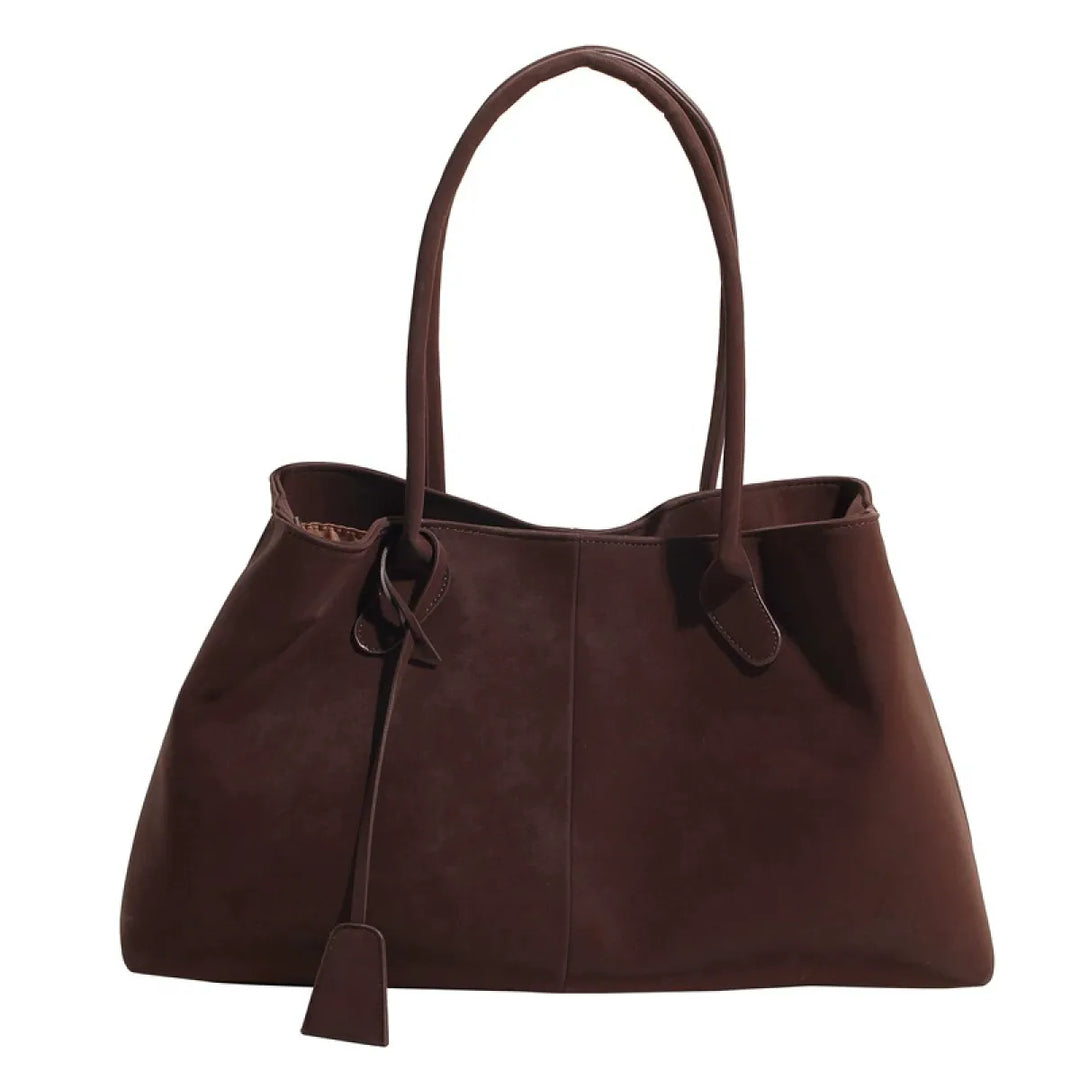 Stijlvolle leren damestas, ruim en functioneel. Perfecte tote tas voor vrouwen, geschikt als werk tas of dagelijks.