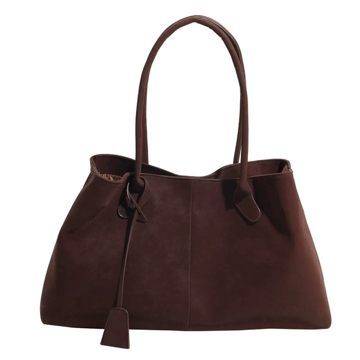 Stijlvolle leren damestas, ruim en functioneel. Perfecte tote tas voor vrouwen, geschikt als werk tas of dagelijks.