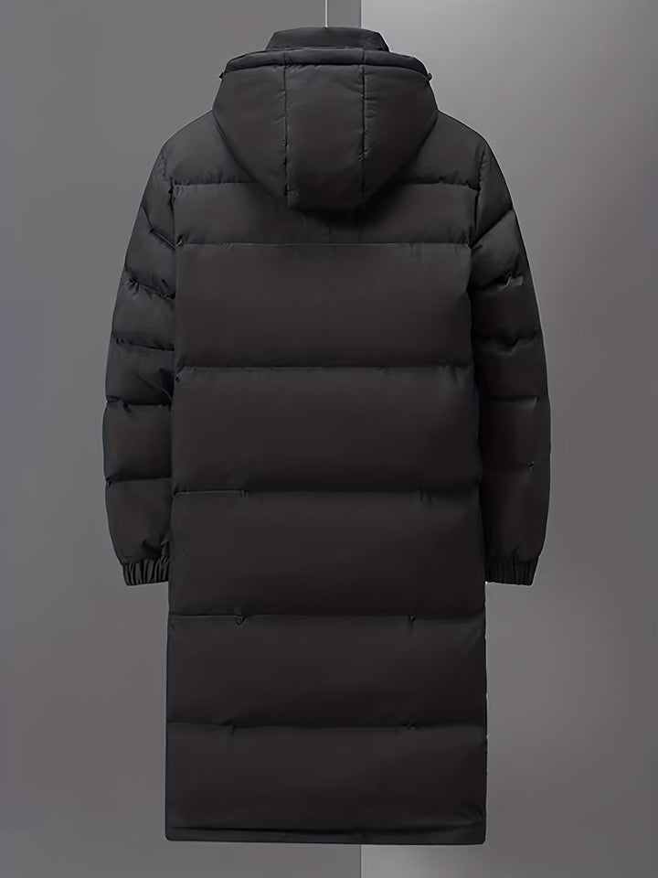 Stijlvolle witte lange dames pufferjas, perfect als warme winterjas en comfortabele bovenkleding.