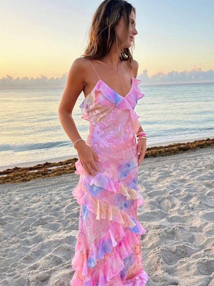 Vrolijke Liora zomerjurk met ruches, v-hals en heldere kleuren; de perfecte casual jurk voor warme dagen.