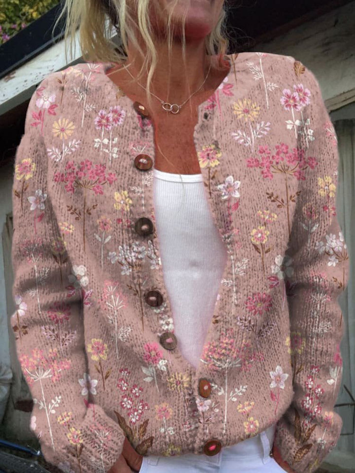 Zacht en comfortabel dames vest met vrolijke bloemenprint en praktische knoopsluiting voor elke dag.