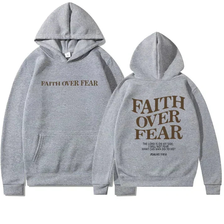 Witte uniseks hoodie 'Geloof Over Angst' voor dames. Trendy christelijke kleding, inspirerende boodschap.