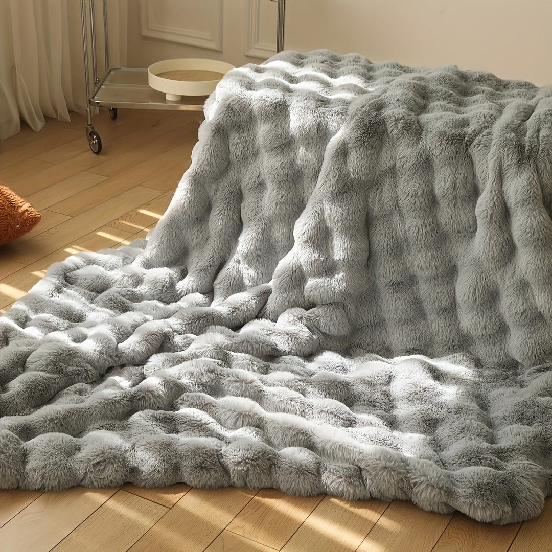 Ontspannende fleece deken, zacht en warm, ideaal voor een momentje rust thuis of op kantoor.