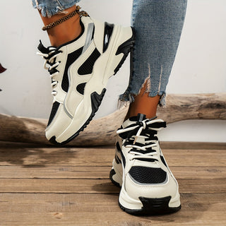 Comfortabele sportieve dames sneakers Romi met hoge zool, ideaal voor een trendy casual look.